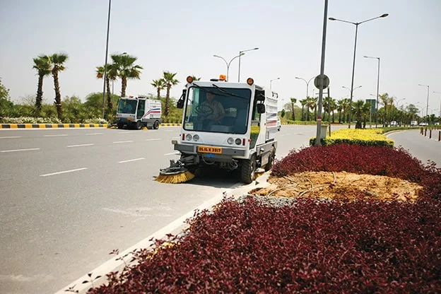 imported machine cleaning the road