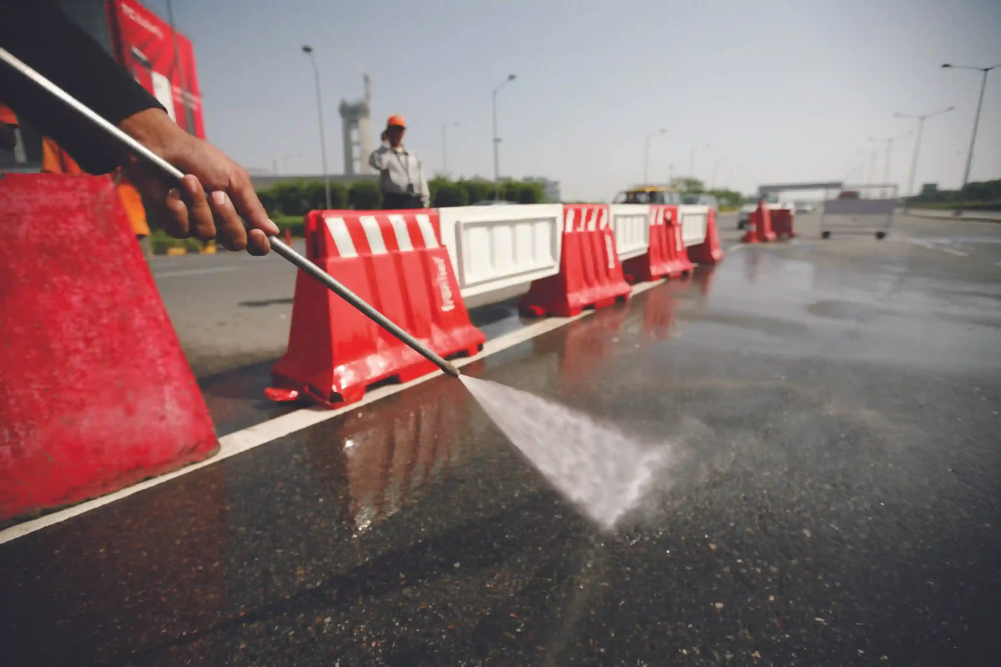 cleaning the road using power washing