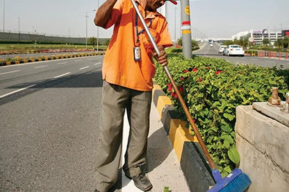 manual sweeping of the road